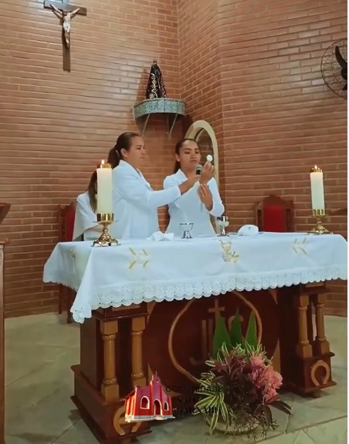 Woman gives Communion